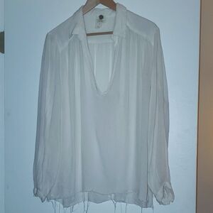 Free People One poet's top. Gauzy material.  Women's Blouse. Size xs/s